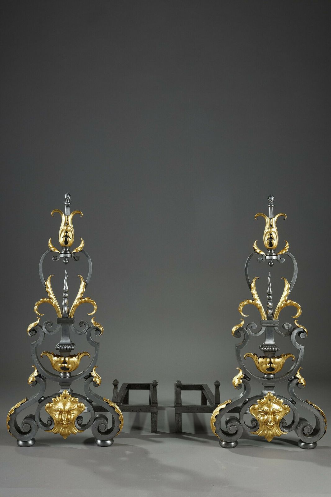 Pair Of Wrought Iron Landiers With Foliage, Mask And Scroll Decoration photo furniture