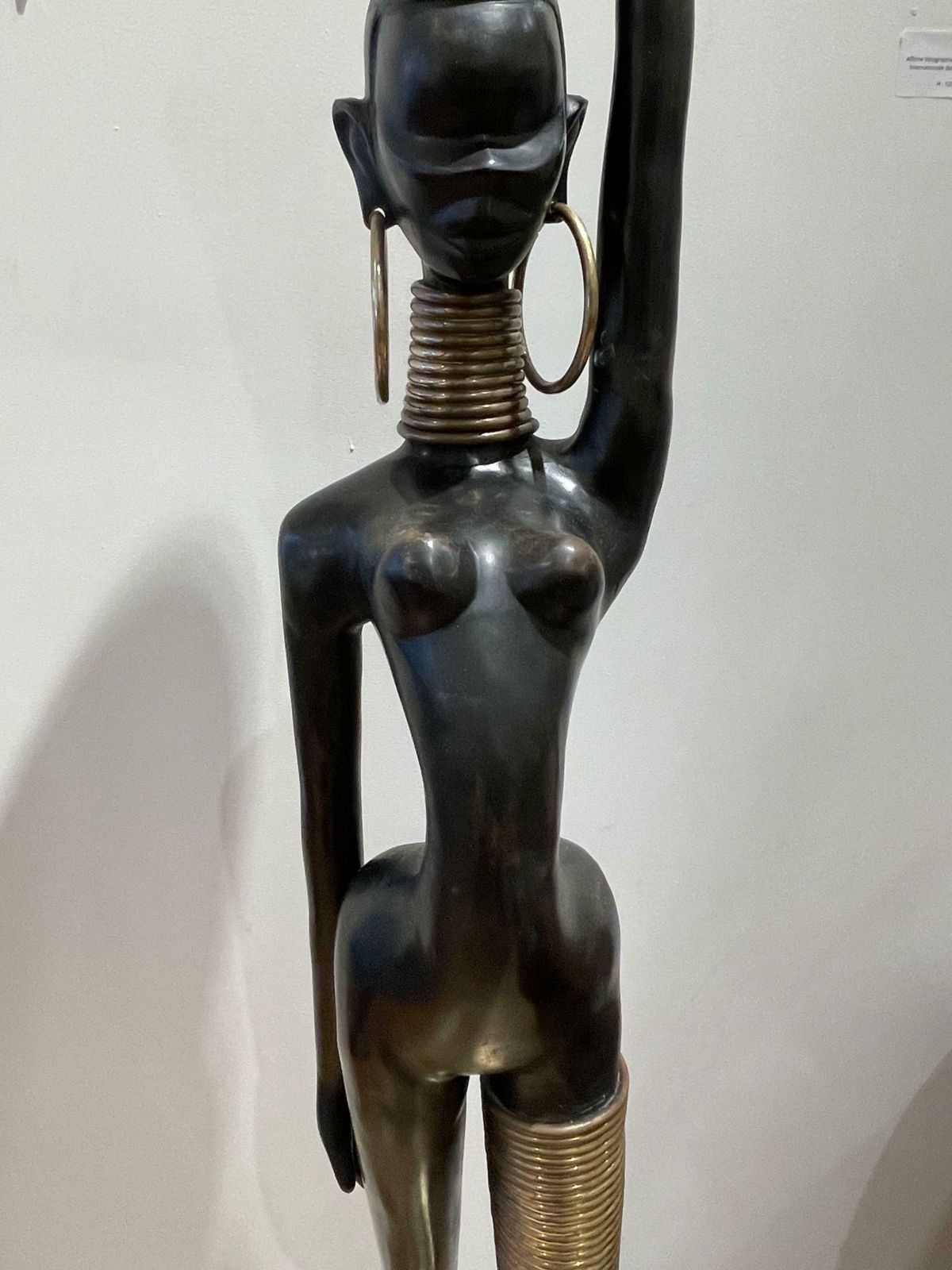 photo furniture Bronze Figurine Of A Woman Carrying Water, In The Style Of Hagenauer