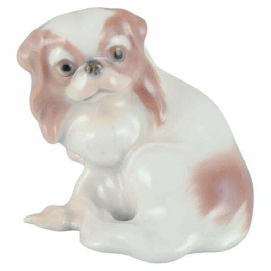 Dahl Jensen For Bing & Grøndahl. Small Porcelain Figurine Of A Pekingese Dog.