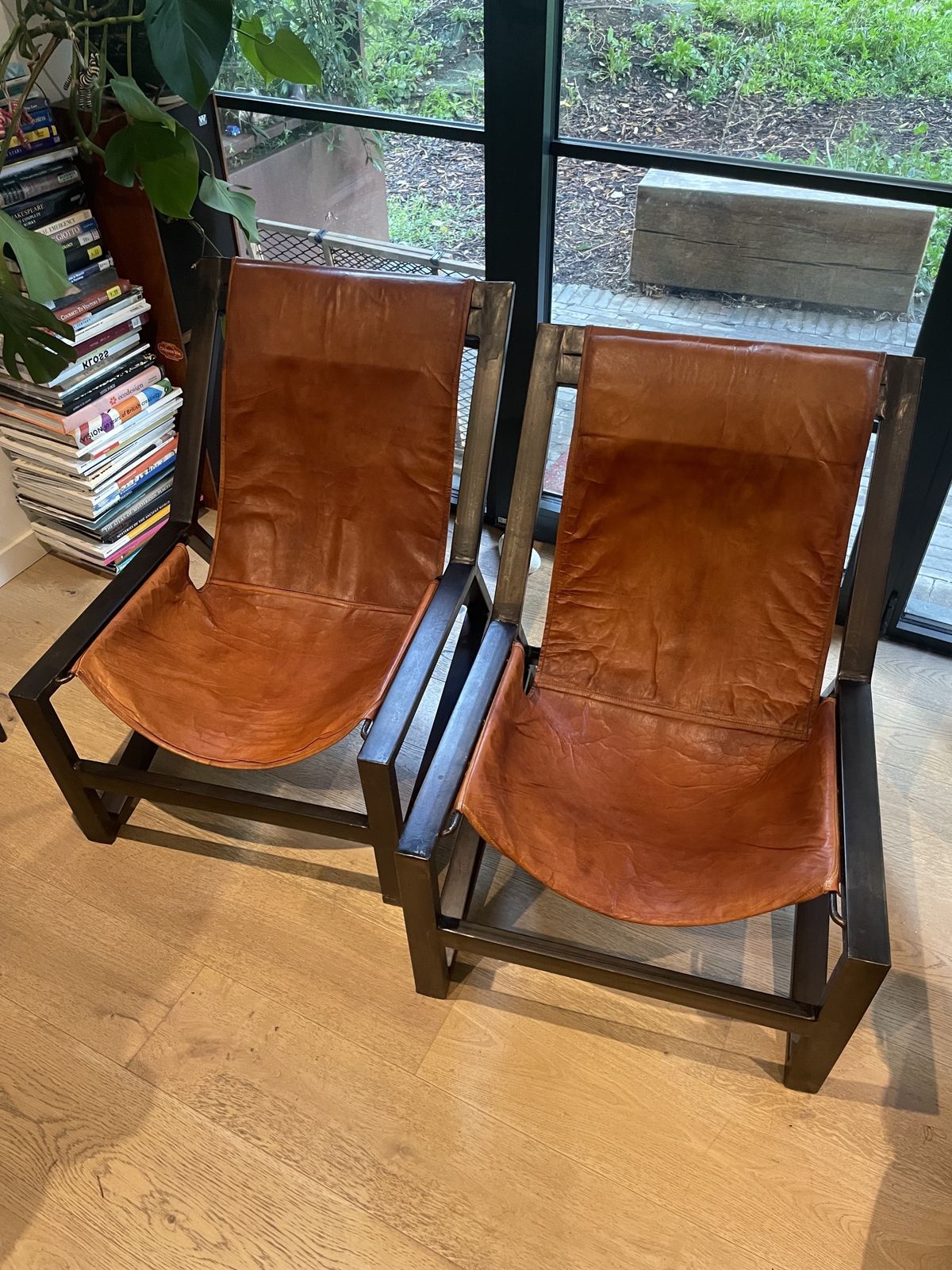 photo furniture Mid Century Style Pair Of Iron & Leather Lounge Chairs