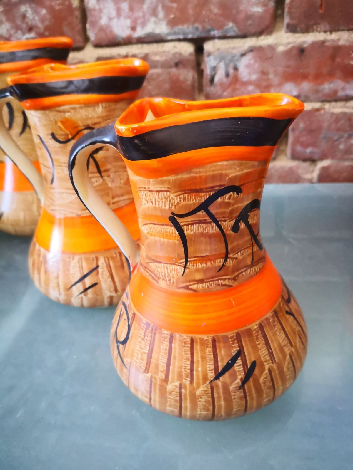 Trio Of Art Deco Graduating Myott Hand Painted Orange, Brown And Black Jugs photo 90.0