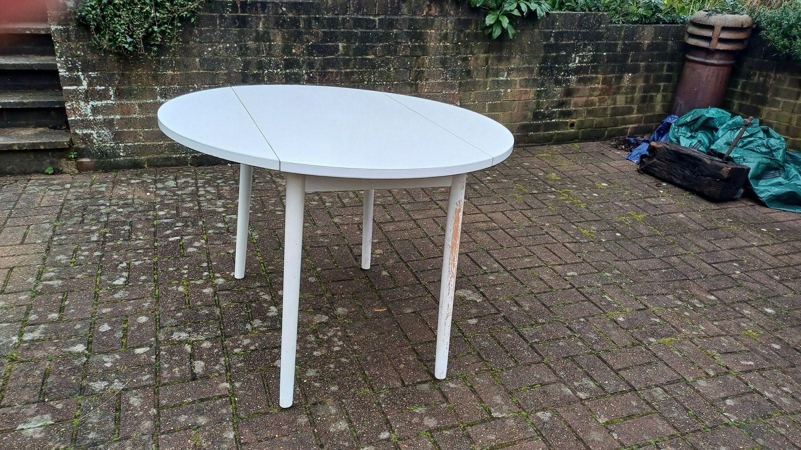 photo furniture Classic Vintage Retro 70s Dining Kitchen Table White Formica Top And Wooden Legs. Legs Are Detachable For Access. 'Dinette'. Drop Leaf.