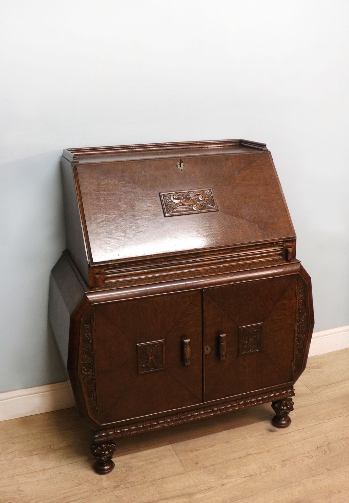A Most Unusually Configured Oak Veneered Bureau. photo for sale