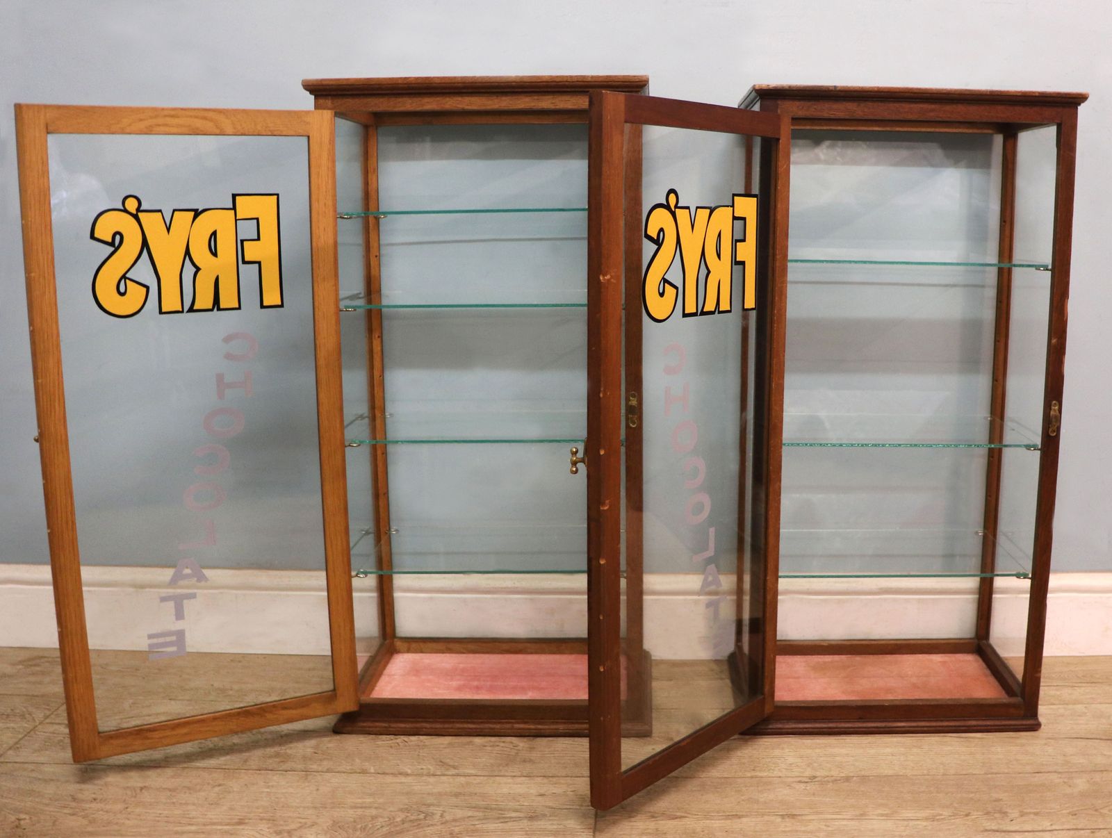 A Lovely Pair Of Early 20th Century Counter Display Cabinets Later Sign Written For Frys Chocolate. photo Furniture