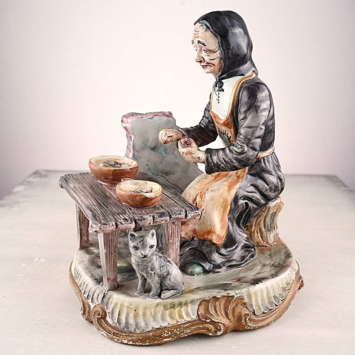 Bassano Porcelain Statue Of Elderly Figure With Cat photo buy