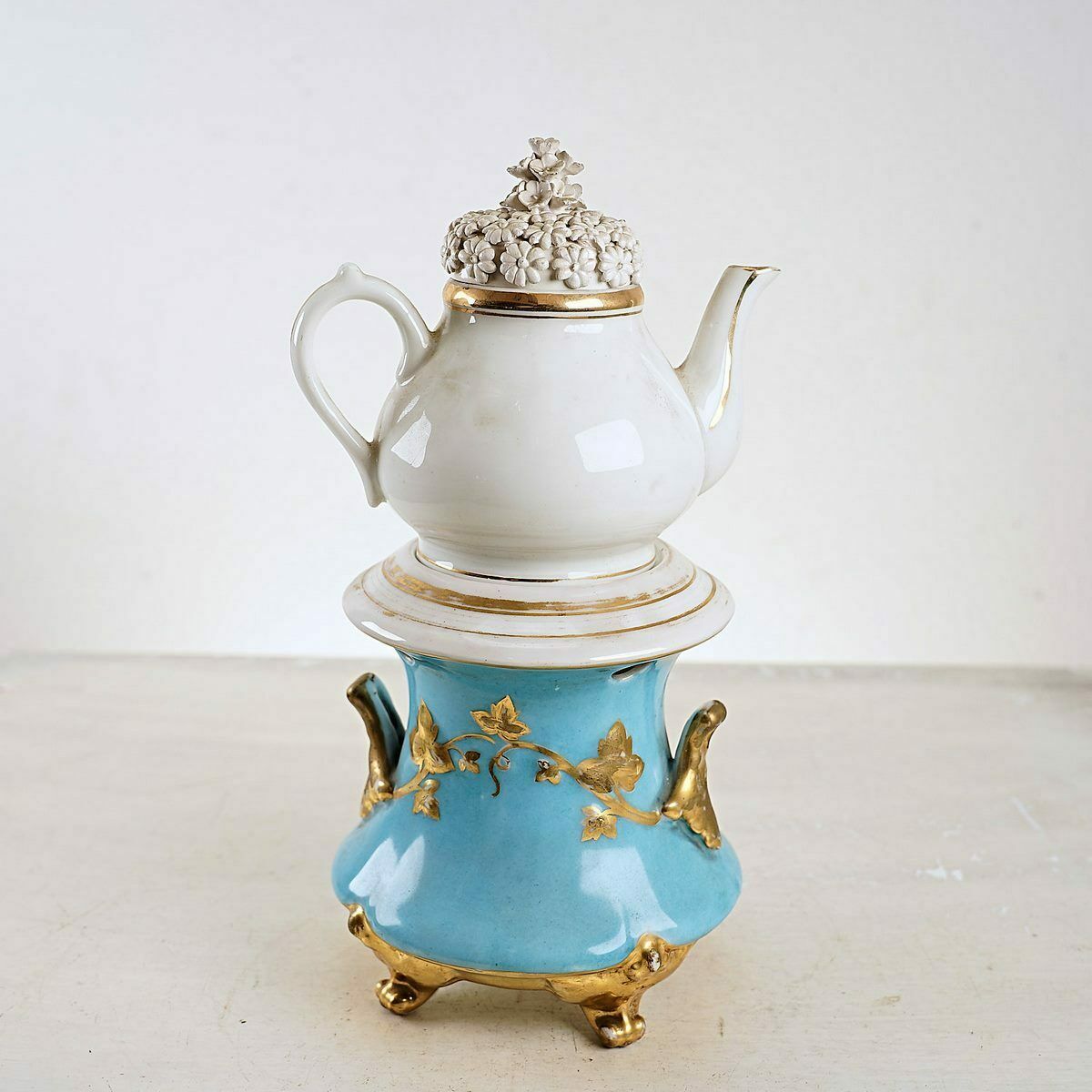 Antique Porcelain Teapot With Floral Decorations And Golden Details photo for sale