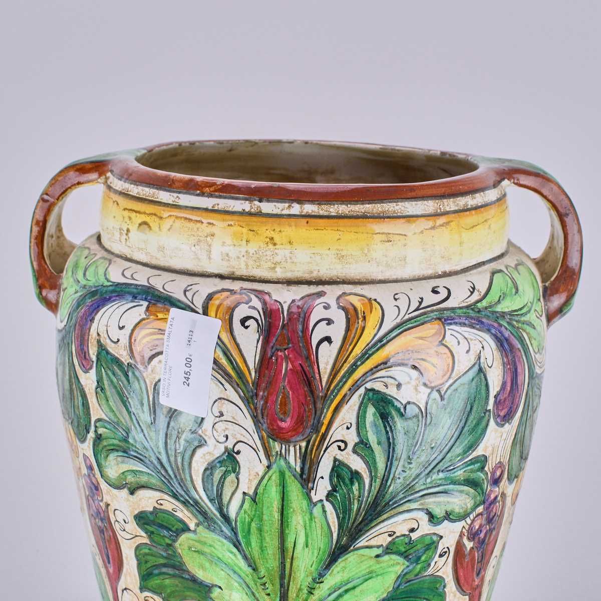 Glazed Terracotta Vase With Floral Motif photo furniture