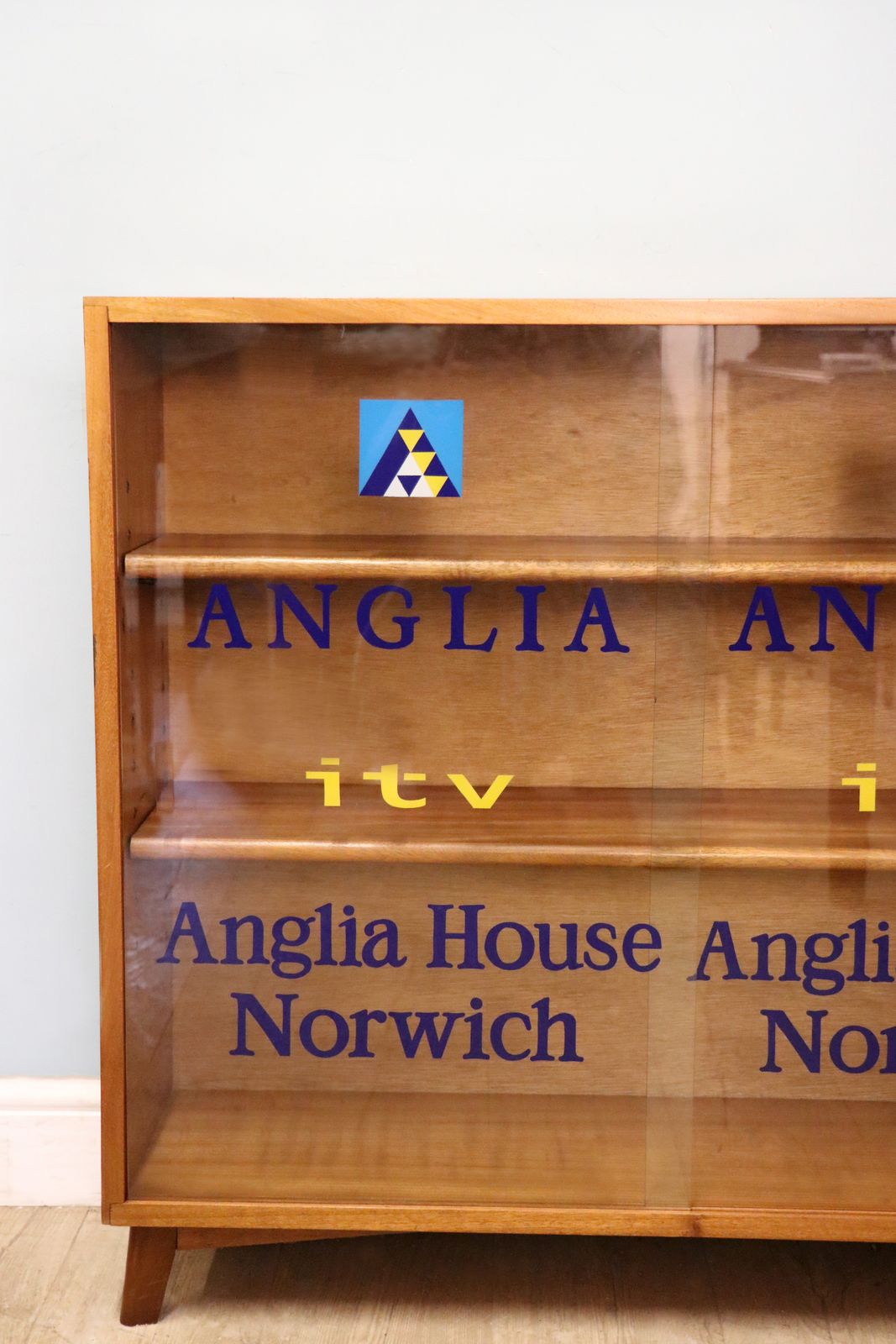 photo buy A Lovely Quality Mid Century Bookcase Cabinet,  Later Sign Written For Anglia Television.