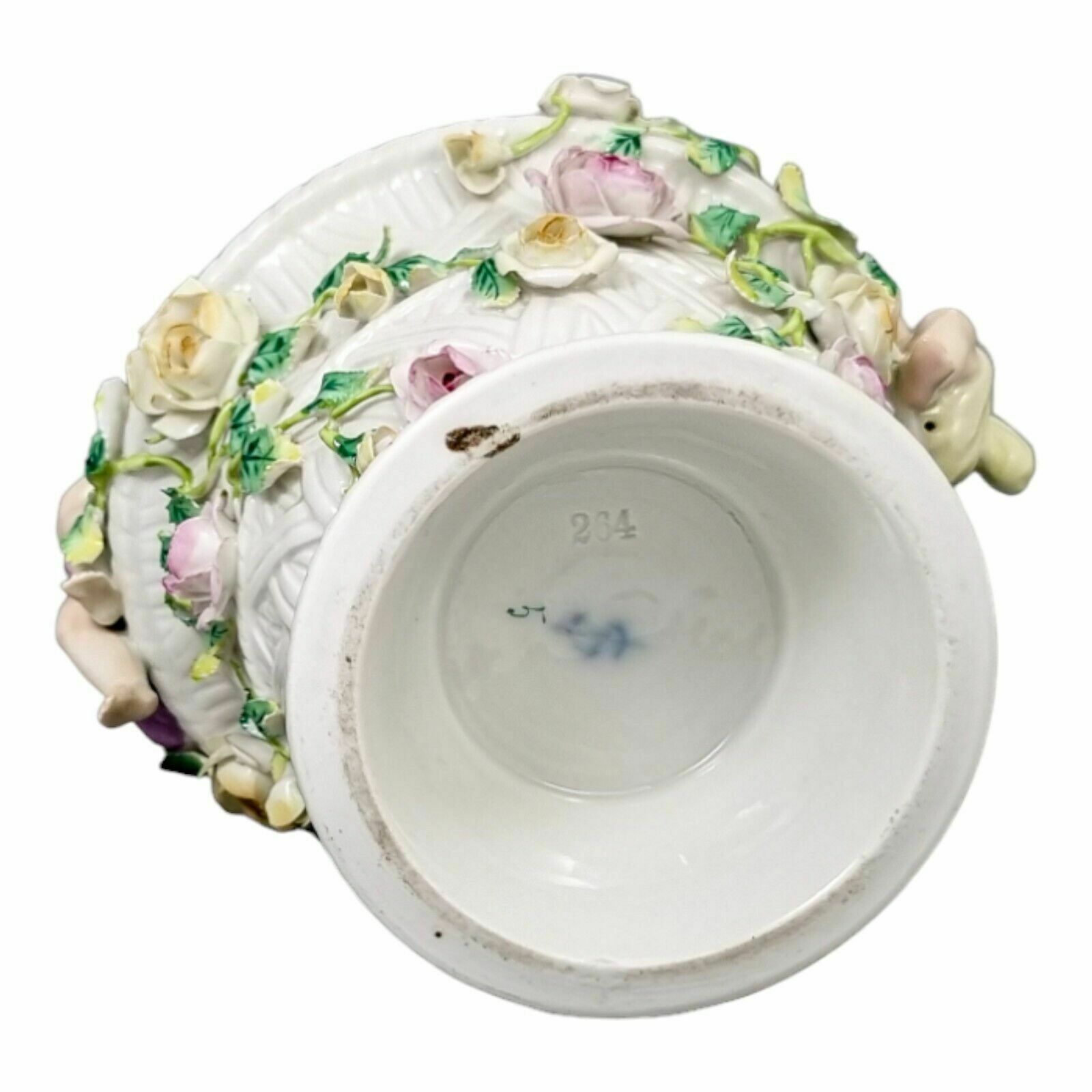photo for sale 19th Century German Porcelain Basket Weave Vase With Rose Garlands And Cherubs