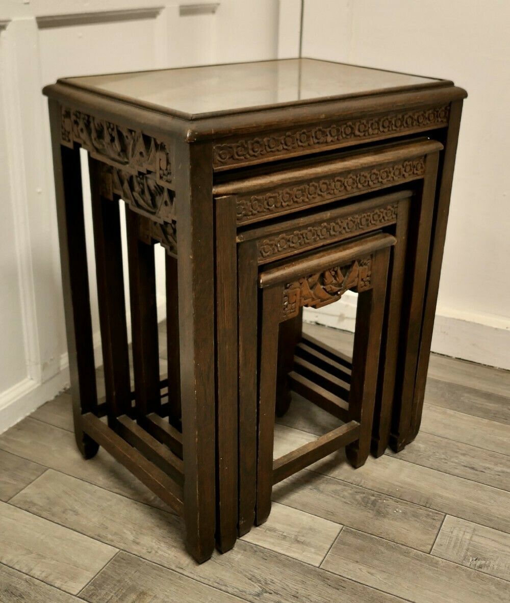 1194.0 Beautifully Carved Chinoiserie Nest Of Four Tables photo