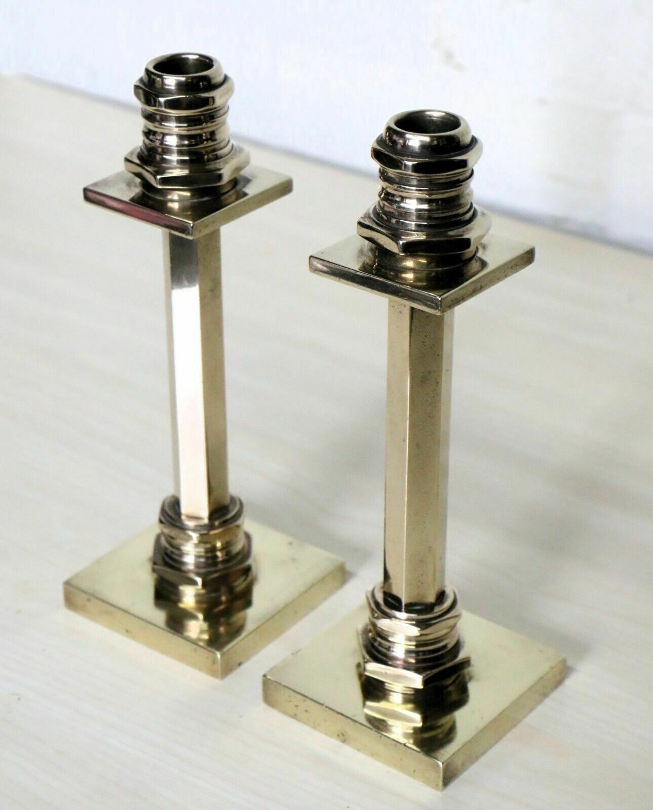 Candlesticks A Pair Of Art Deco Machine Age Brass Antique Candle Sticks photo for sale