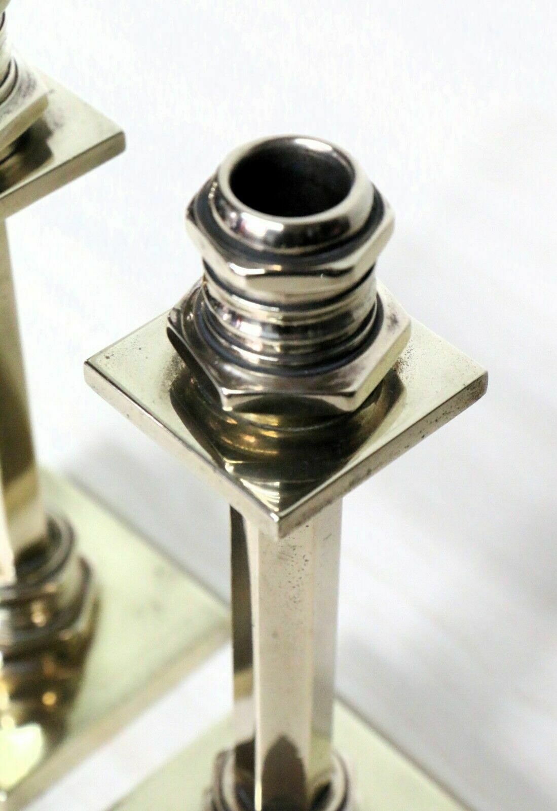 Candlesticks A Pair Of Art Deco Machine Age Brass Antique Candle Sticks photo Home Decor