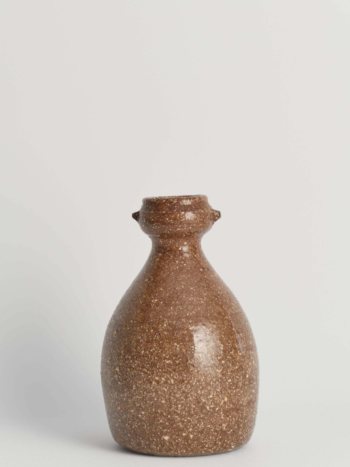 Japanese Shigaraki Inspired Handmade Stoneware Vase With Barnacle Like Texture photo furniture