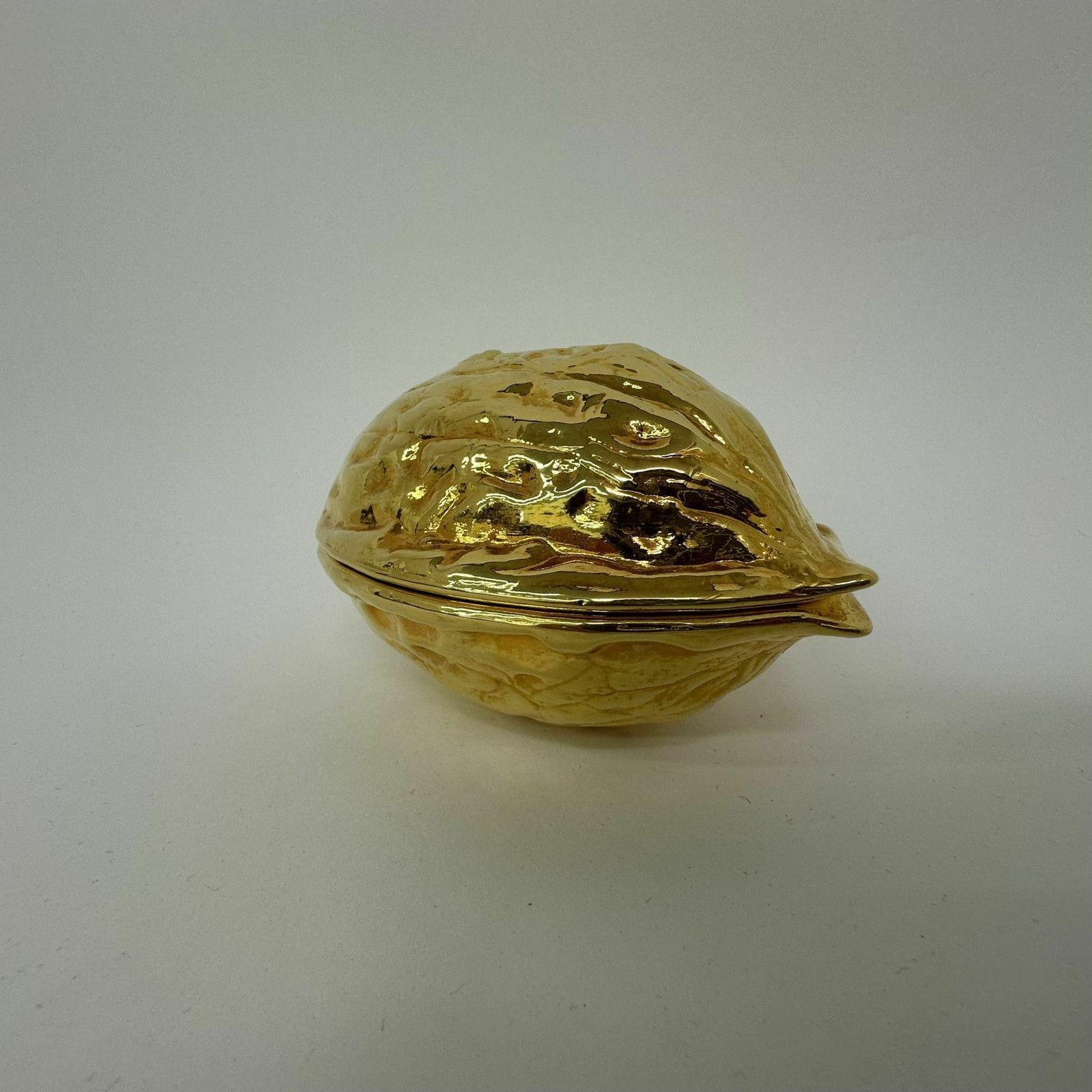 Vintage Gold Walnut Shaped Nut Cracker , 1970’s photo for sale