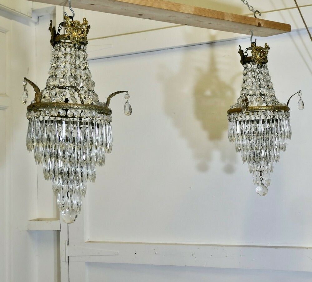 A Pair Of French Empire Style Tent And Waterfall Chandeliers photo Lighting