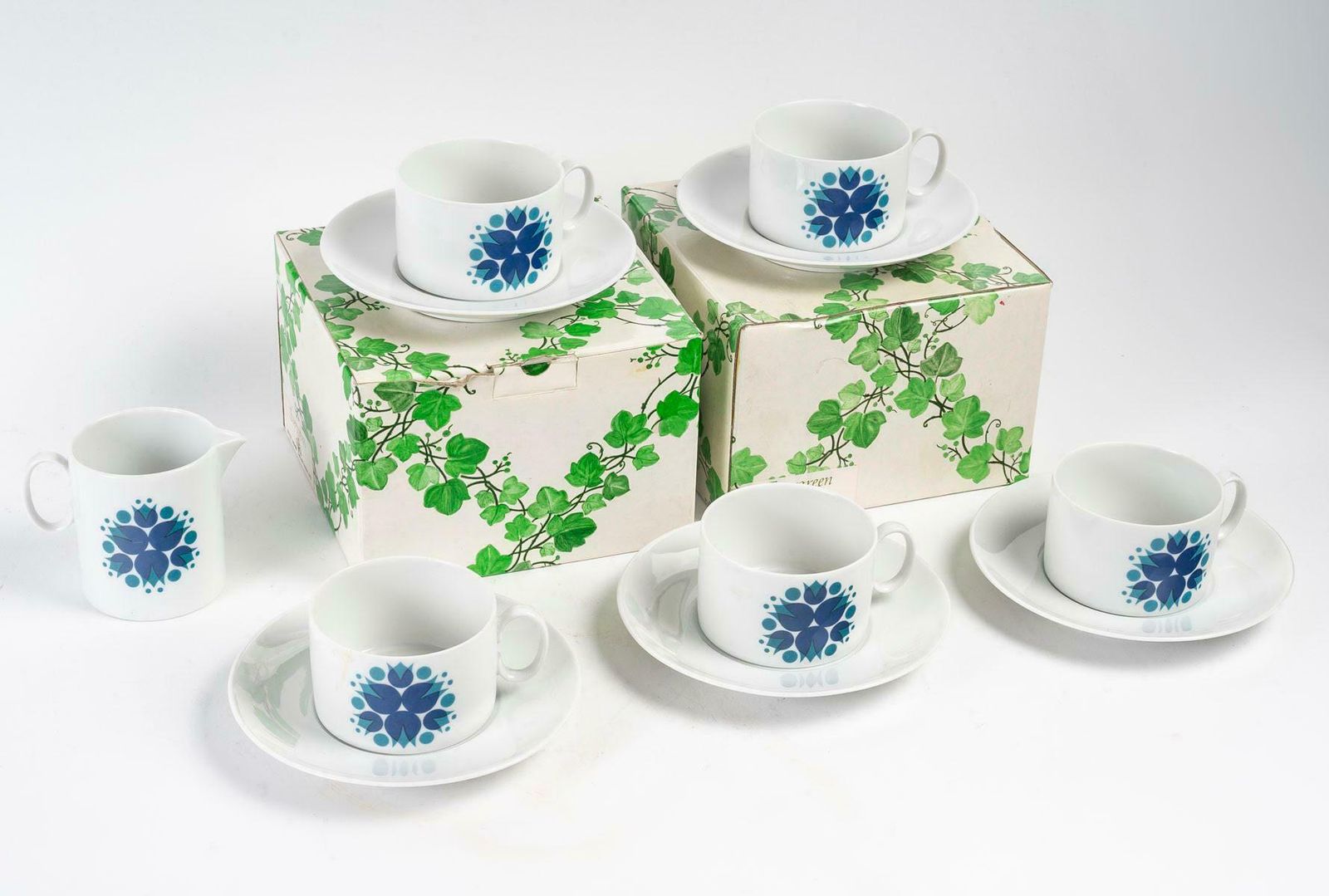 4 Porcelain Cups And Saucers From The 1960s By Maison Thomas. photo furniture