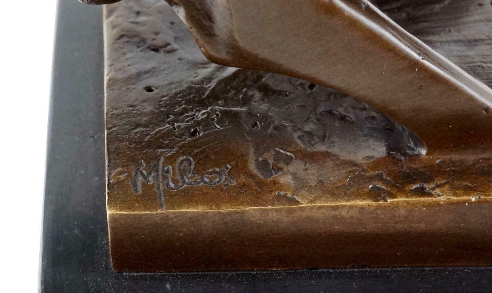 Bronze Sculpture Of A Bull In Motion, 20th Century. photo vintage