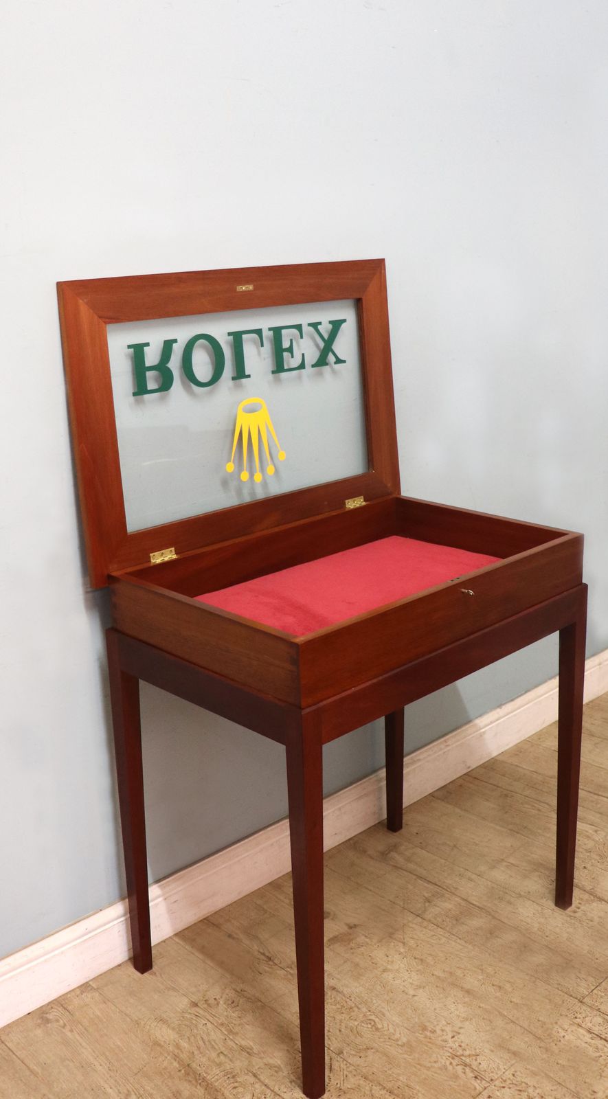 A Superb Bijouterie Display Table, Hand Sign Written With The Famous Rolex Watch Emblem. photo Furniture