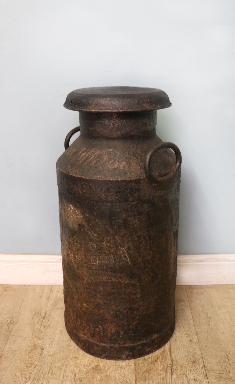 A Wonderful Vintage Iron Milk Churn From The Manchester Area.