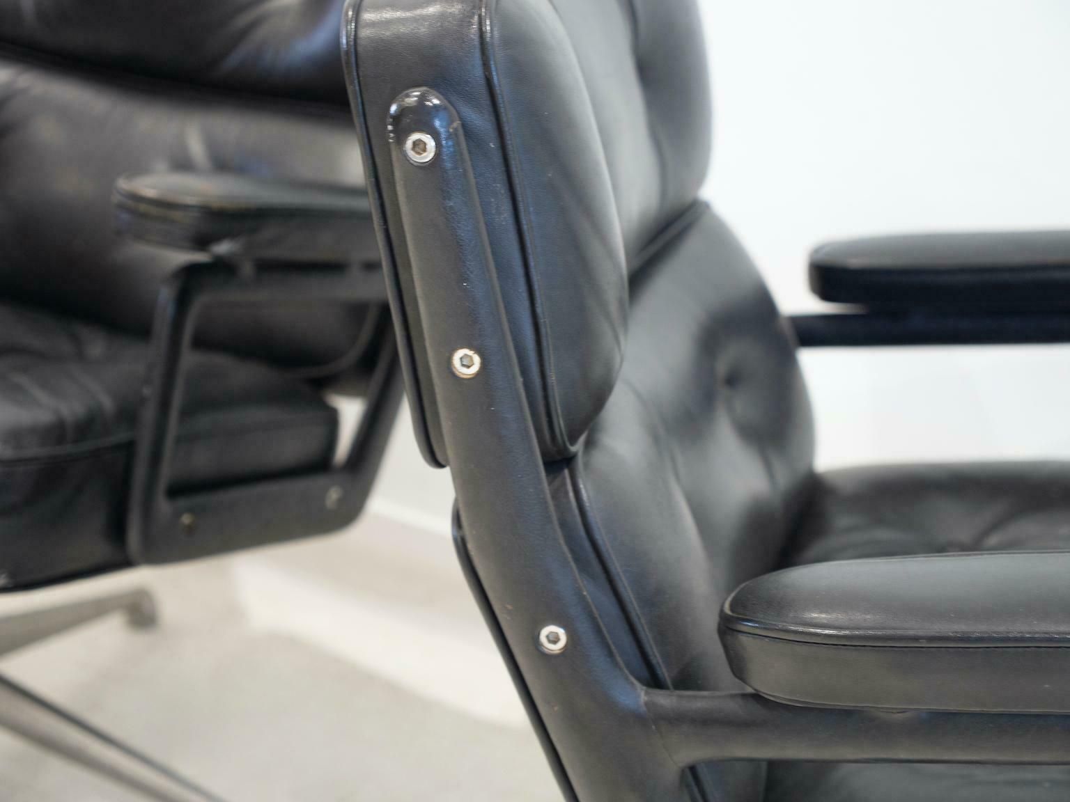 photo buy Pair Of Black Leather Executive Chairs By Charles And Ray Eames