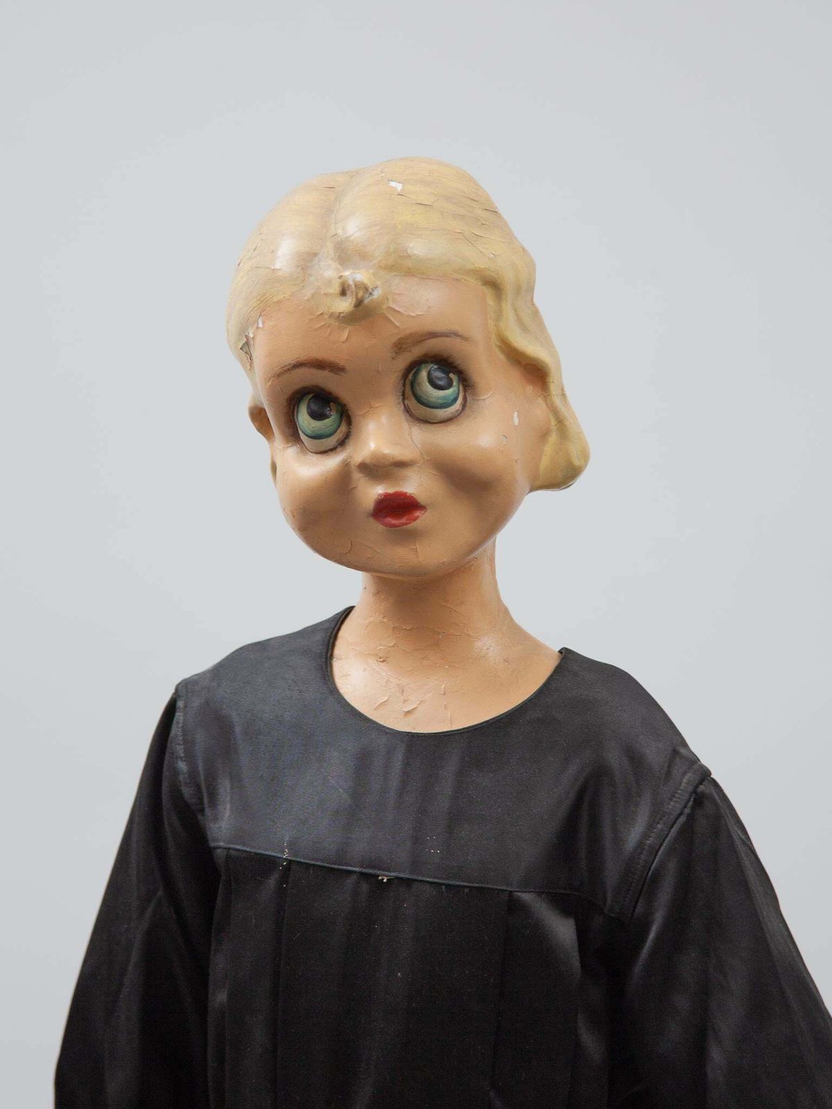 photo furniture Mannequin Of A Young Girl In Black Dress, Shop Display, 1950s