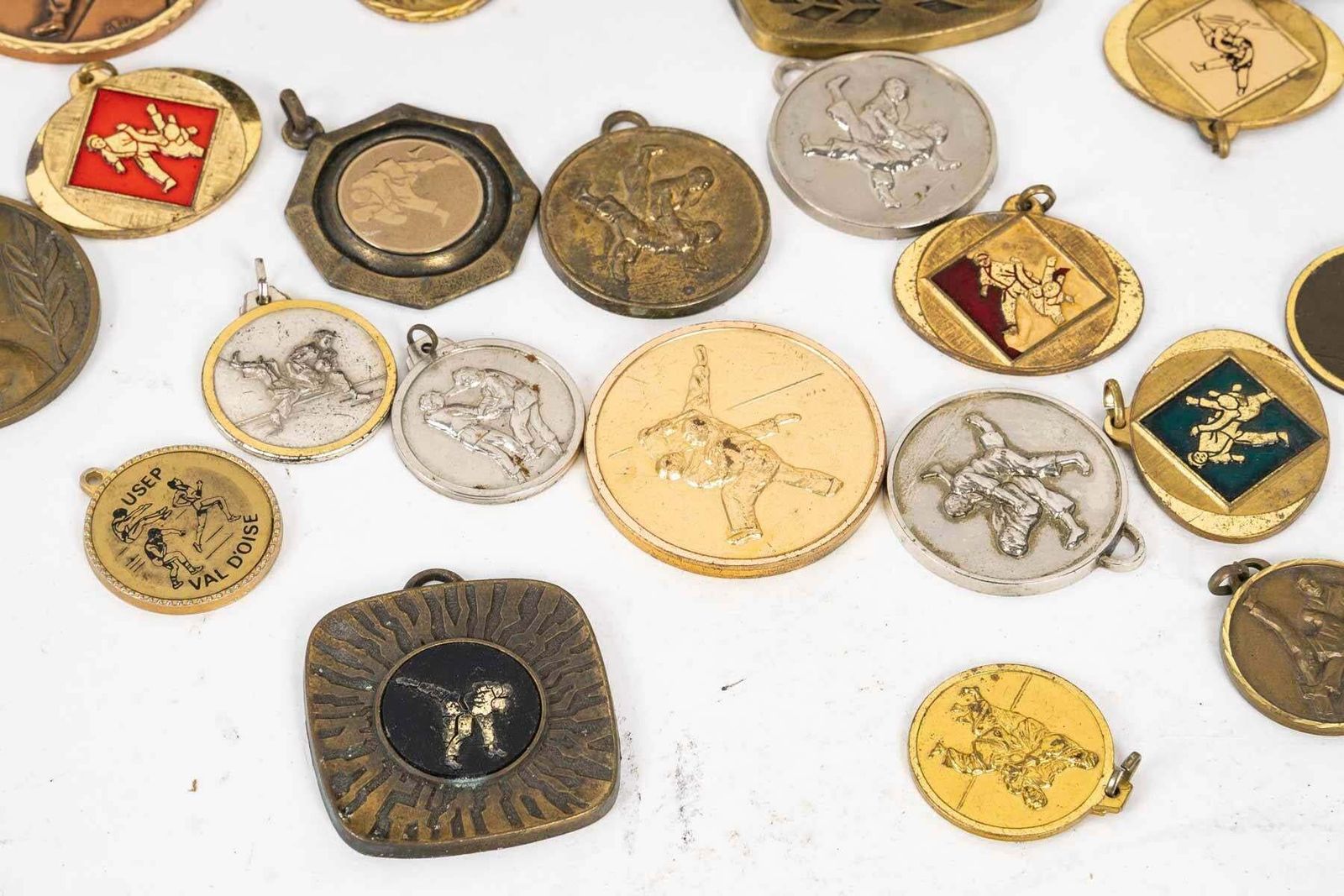 Set Of 25 Sports Medals, 20th Century. photo furniture