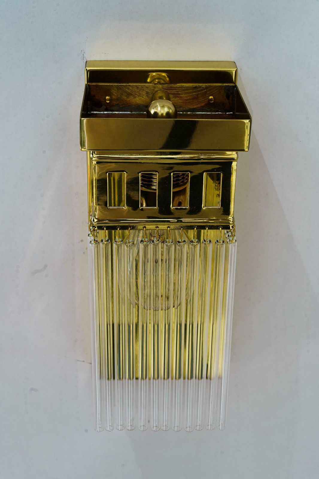Reproduction Of A Art Deco Wall Lamp With Glass Sticks photo vinterior