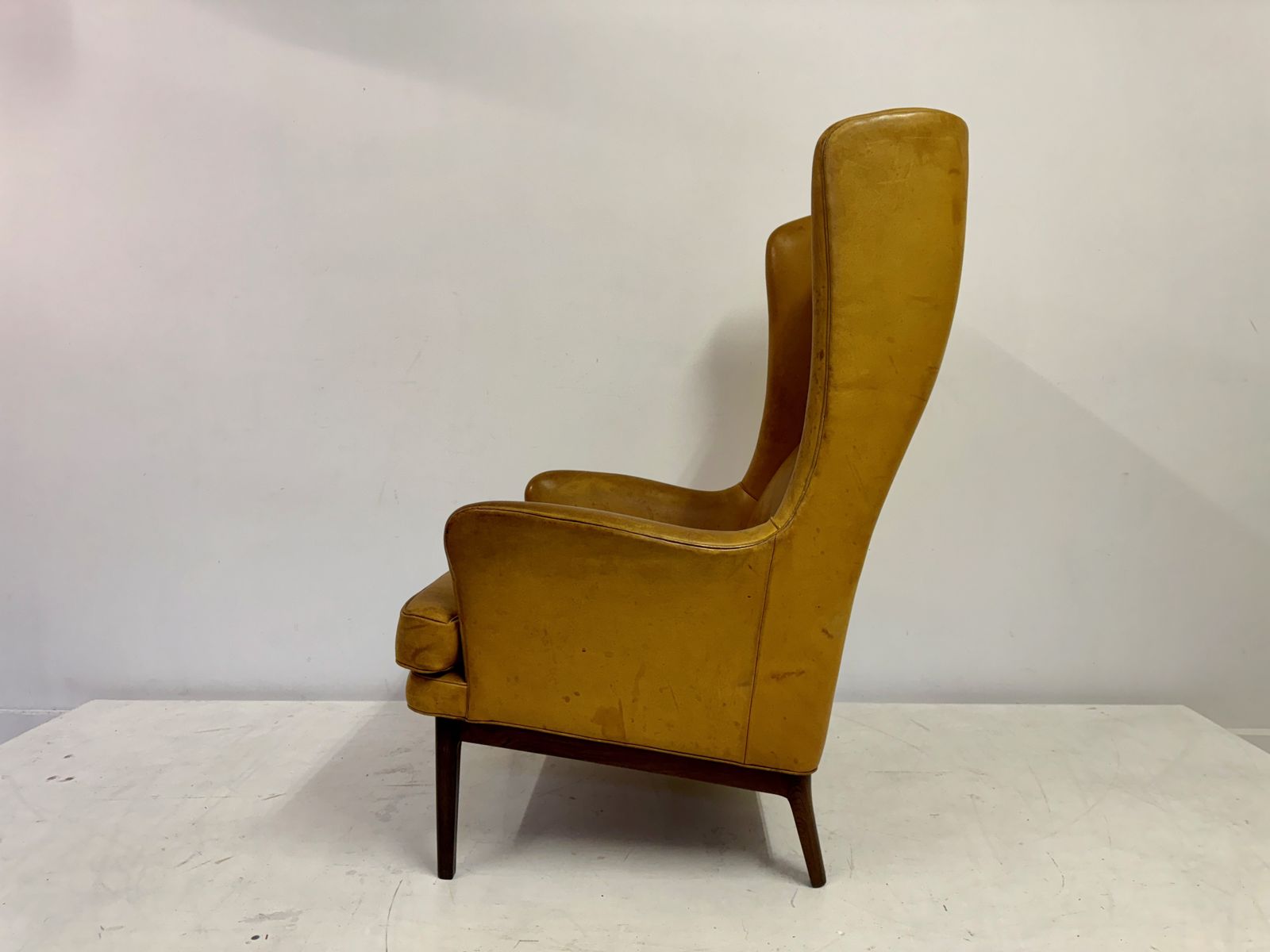 photo for sale 1970s Patinated Leather Wingback Krister Armchair By Arne Norell