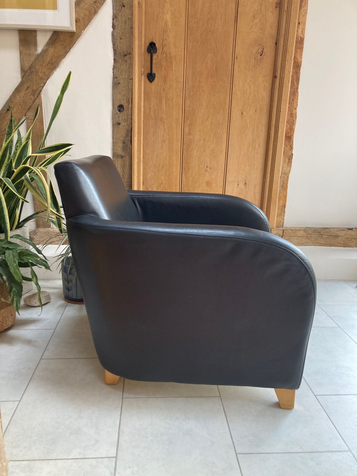 Black Leather Club Chair From Heals By Designer Roger Lewis photo vinterior