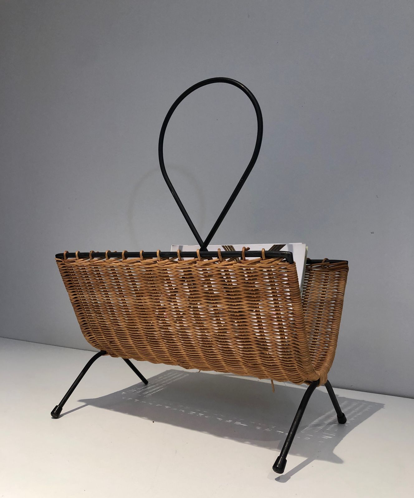 Rattan And Black Lacquered Metal Magazine Rack photo vinterior
