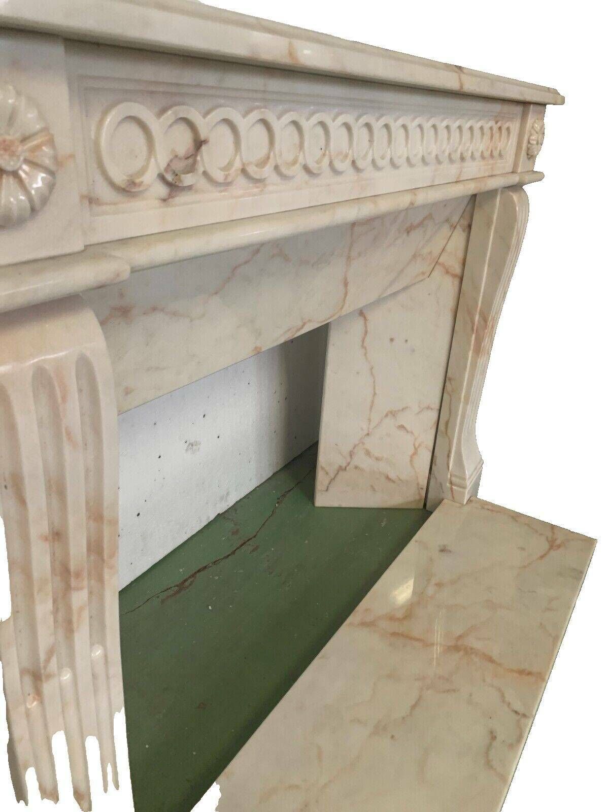 photo furniture Louis XVI Style Fireplace In Pink Veined Marble XX Century