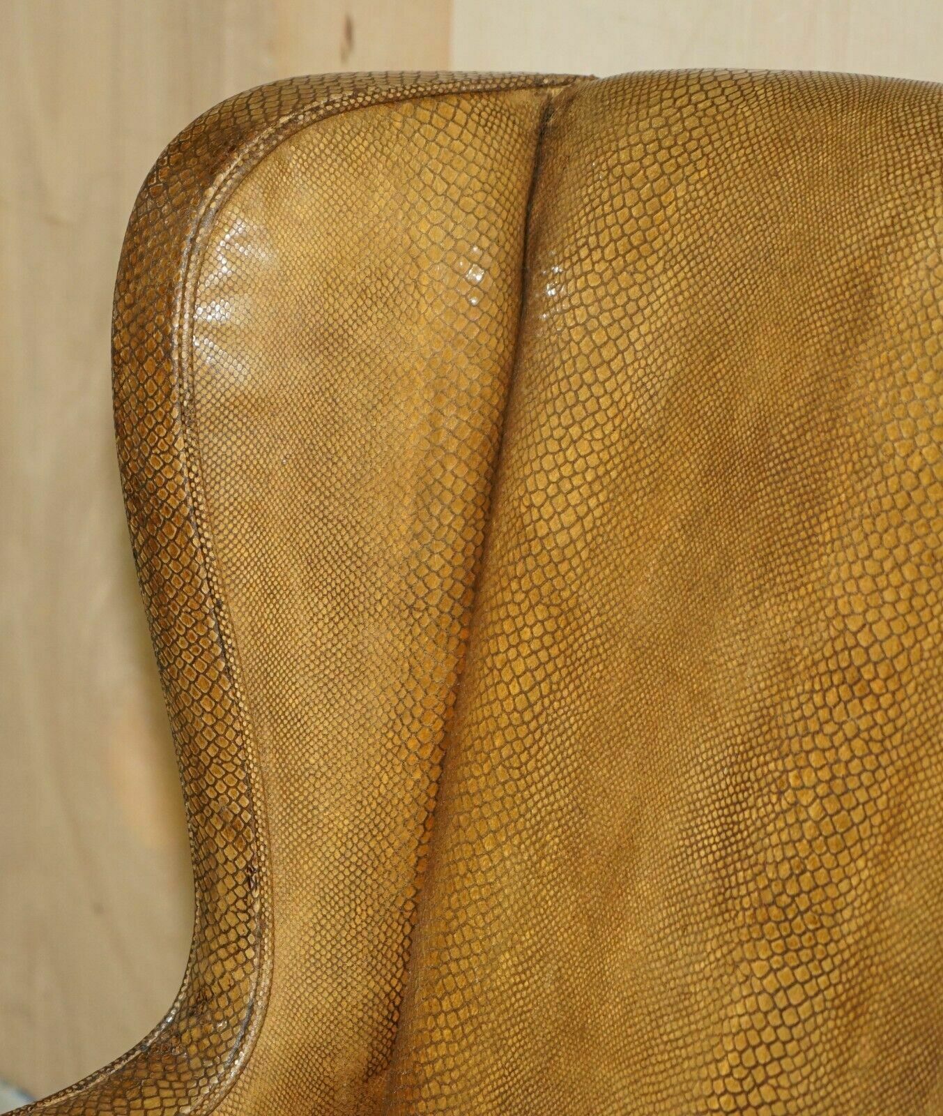 photo furniture Exquisite Spanish Wingback Armchair With Alligator Crocodile Leather Upholstery