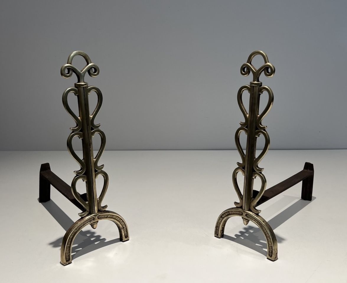 Pair Of Andirons In Brass And Wrought Iron In The Style Of Raymond Subes photo for sale