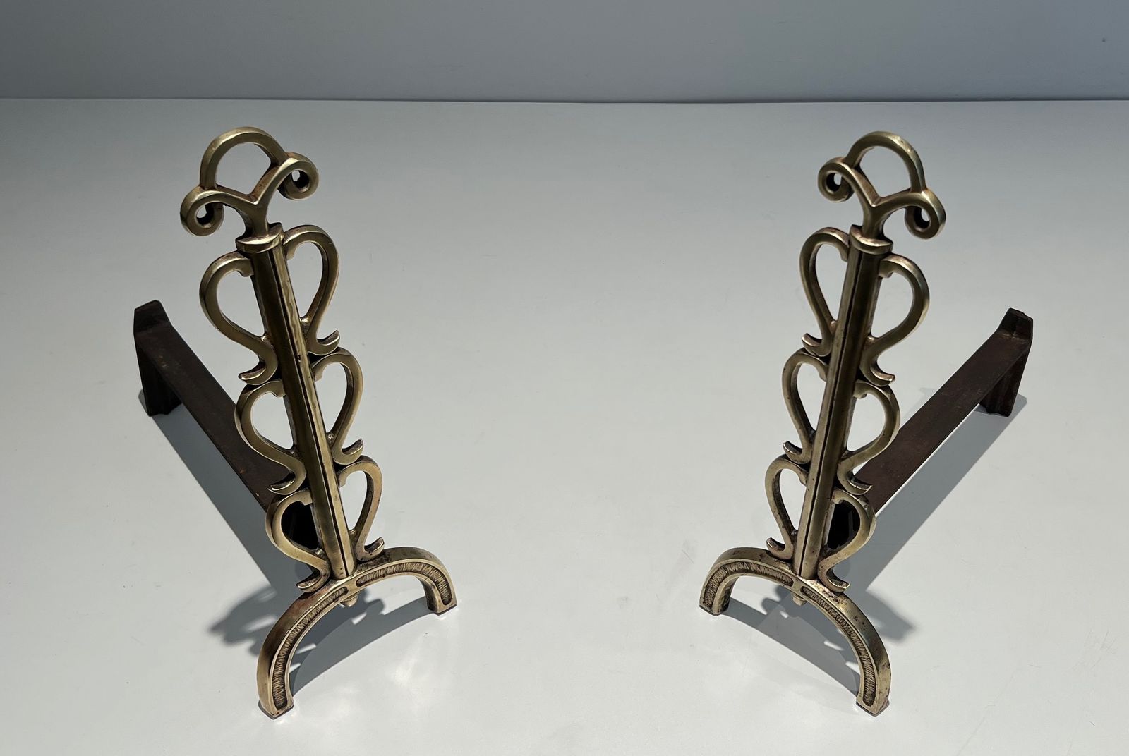 Pair Of Andirons In Brass And Wrought Iron In The Style Of Raymond Subes photo Home Fixtures