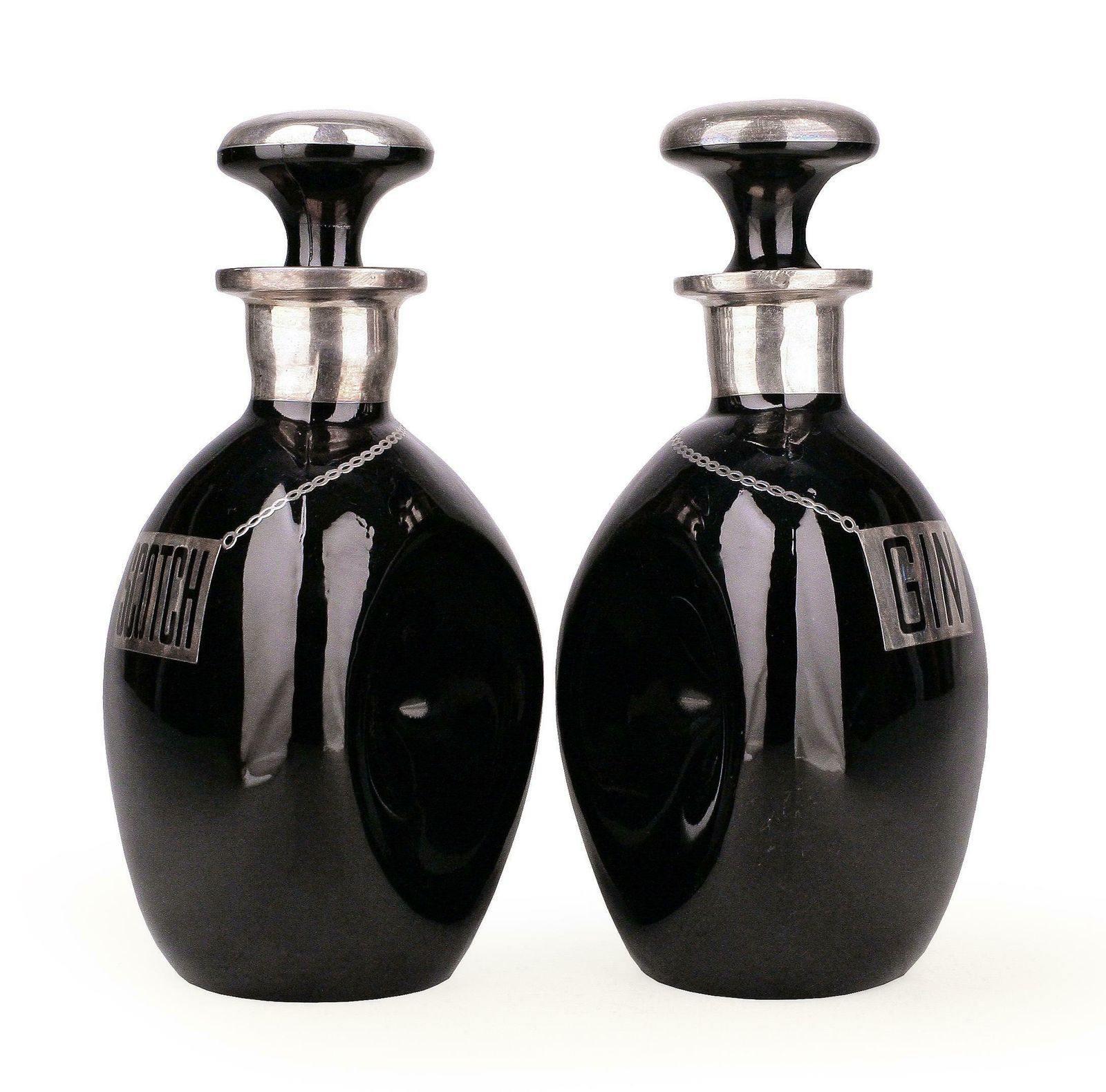 Pair Of Sterling Silver And Glass Art Déco Pinched Black Decanters For Scotch And Gin photo for sale