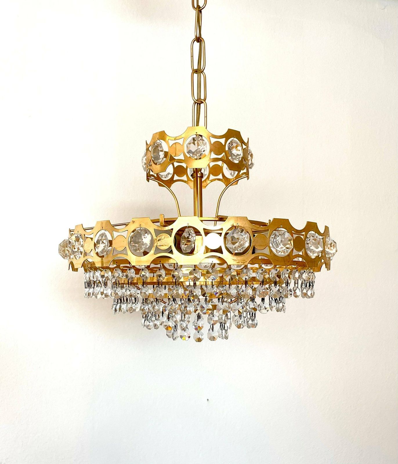 Swedish Mid Century 1970s Luxury Chandelier In Gold Metal With Crystal Cut Glass And Beautiful Details photo vinterior