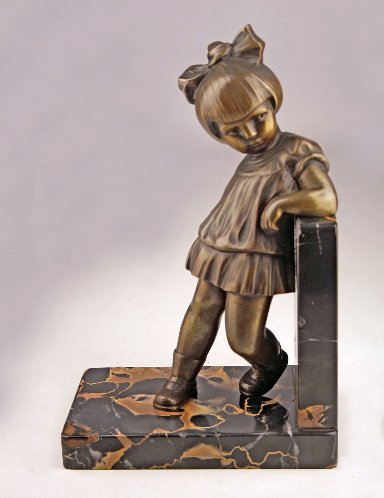 photo furniture Pair Of Art Déco Bronze Bookends With Marble Base Designed By Alexandre Kéléty For Etling Paris