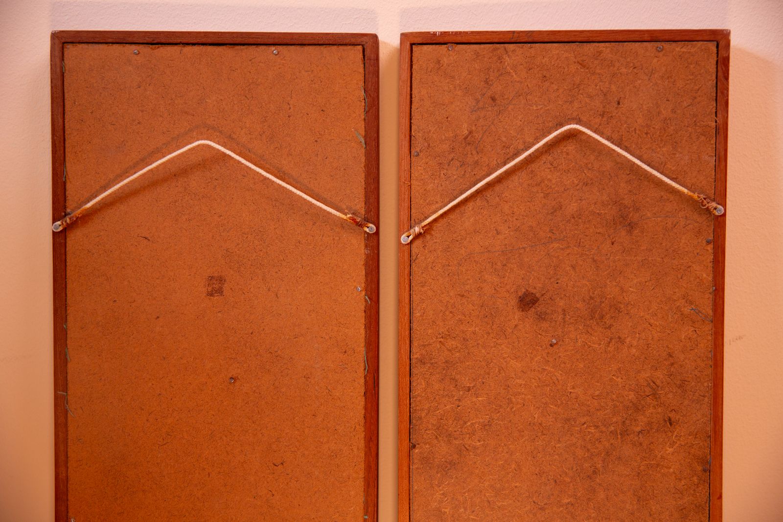 photo for sale Pair Of Mid Century South East Asian Hardwood Wall Sculptures On Blue Canvas In Teak Frames