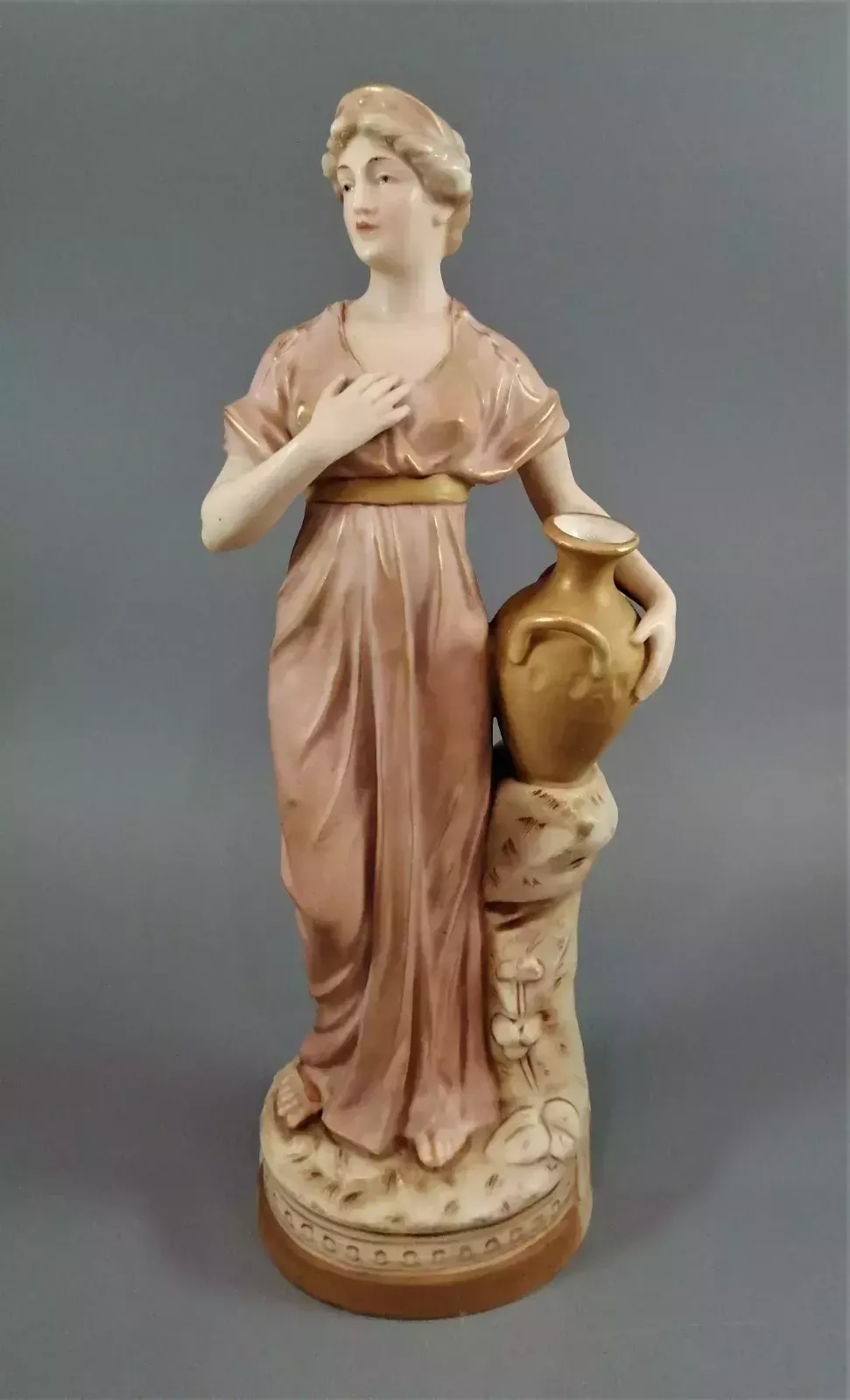 Beautiful Antique Royal Dux Porcelain Figurine Depicting A Lady Holding A Jug. photo furniture