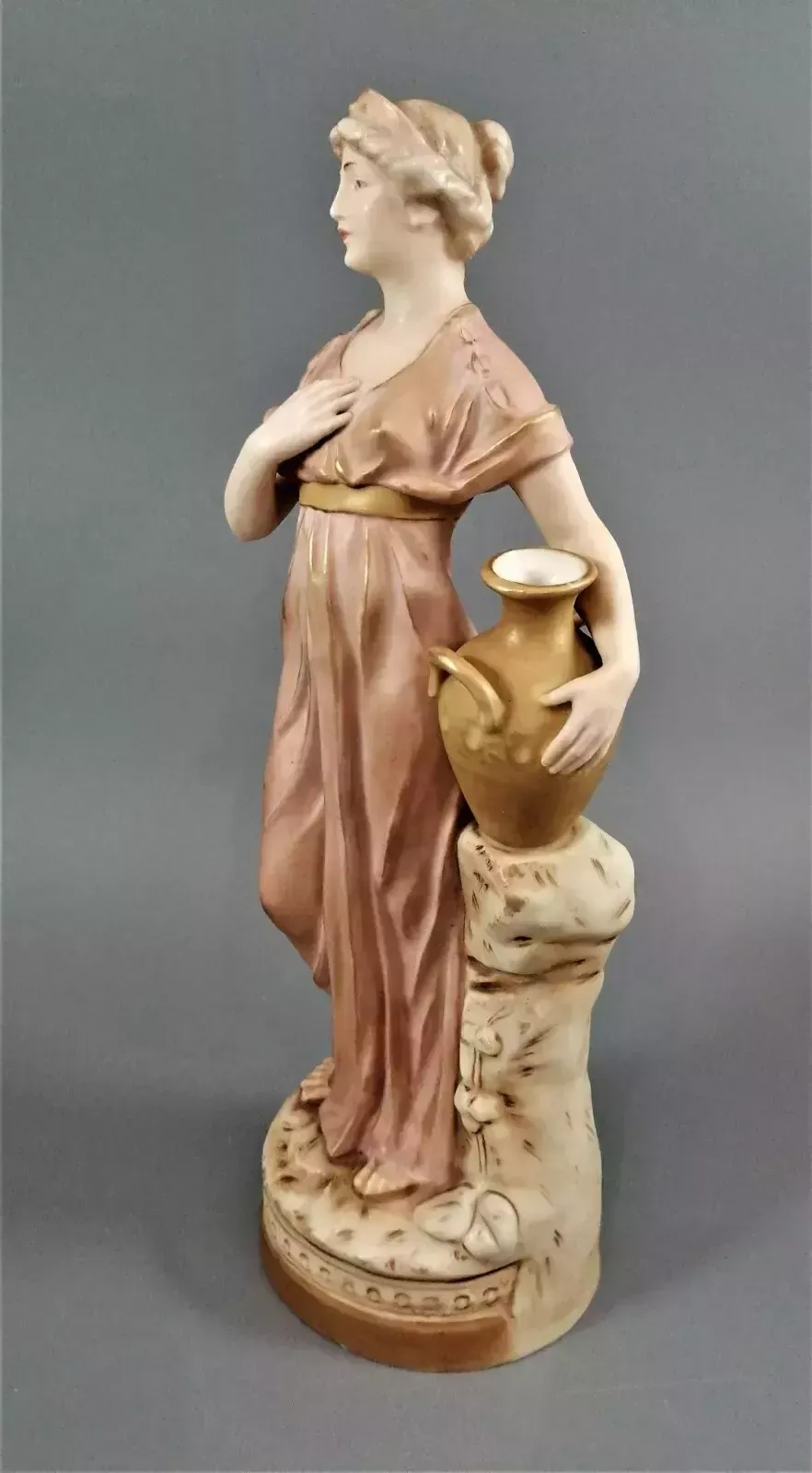 Beautiful Antique Royal Dux Porcelain Figurine Depicting A Lady Holding A Jug. photo for sale