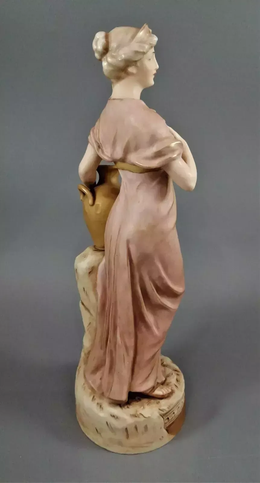 Beautiful Antique Royal Dux Porcelain Figurine Depicting A Lady Holding A Jug. photo vinterior