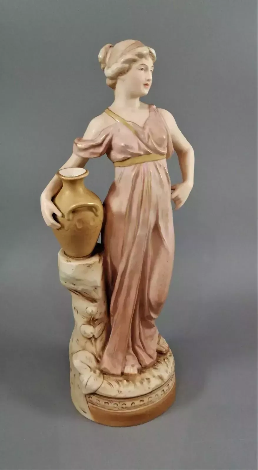 Beautiful Antique Royal Dux Porcelain Figurine Depicting A Lady Holding A Jug. photo buy