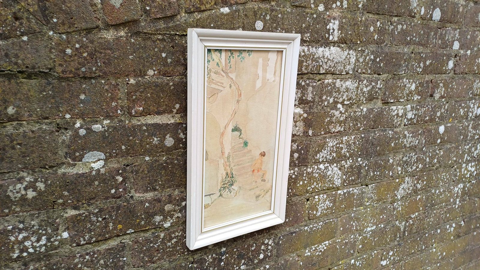 Vintage Watercolour Of A Mediterranean Village Scene, Boy On Steps Enjoying Hot Weather. Small Vertical Painting In Glazed Retro Frame. photo vintage