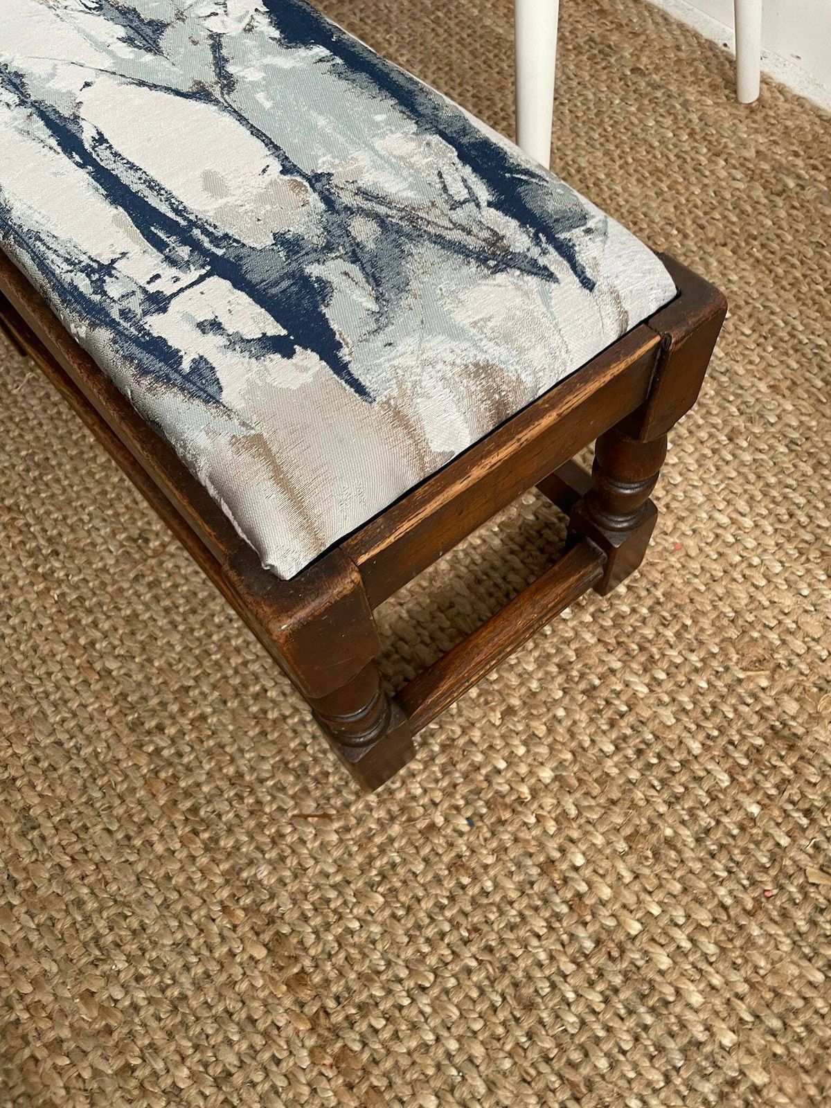 Chunky Dark Wooden Footstool With Andrew Martin Ink Blue Fabric Top photo vinterior