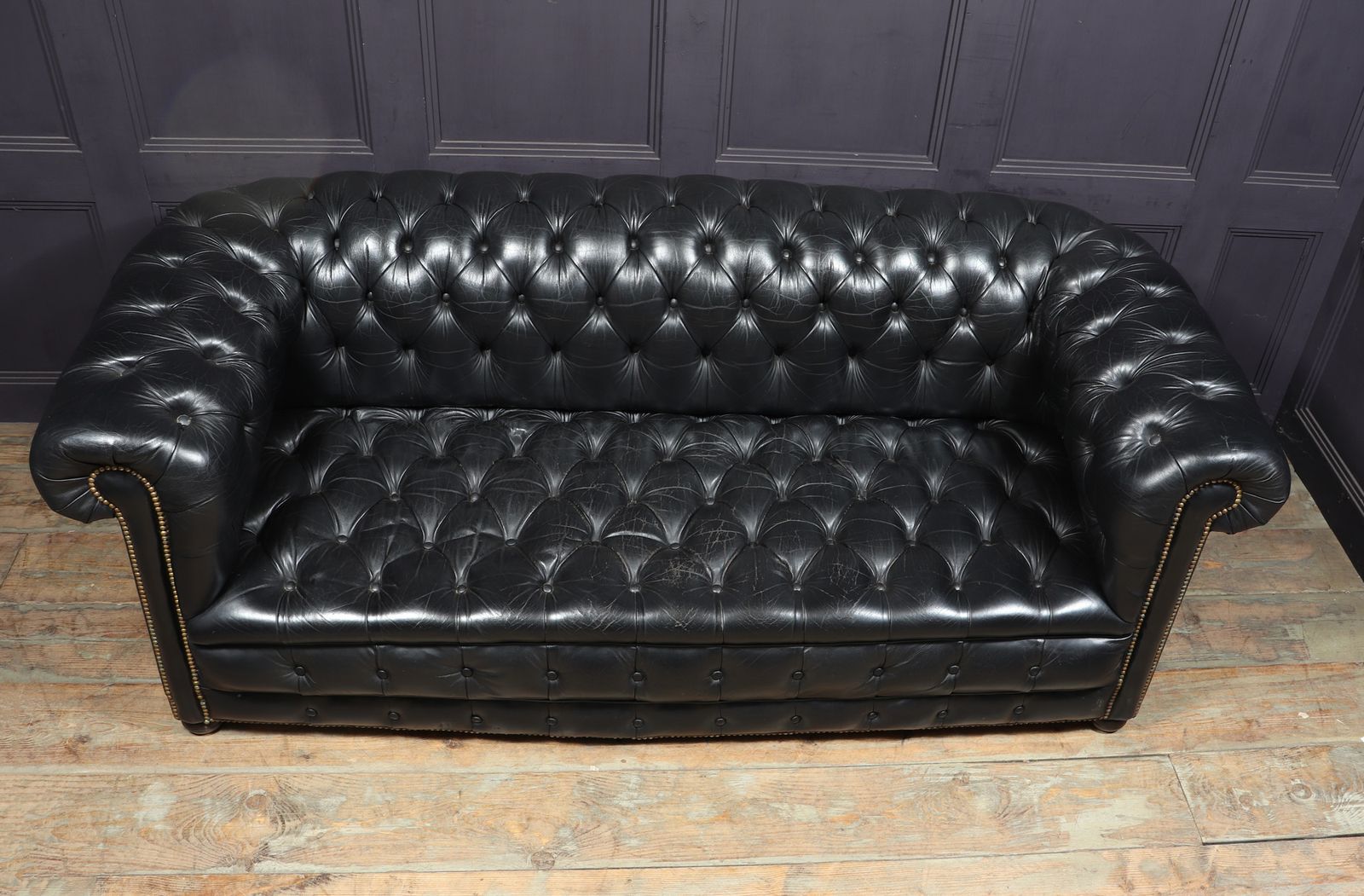 Black Leather Buttoned Seat Chesterfield Sofa photo vintage