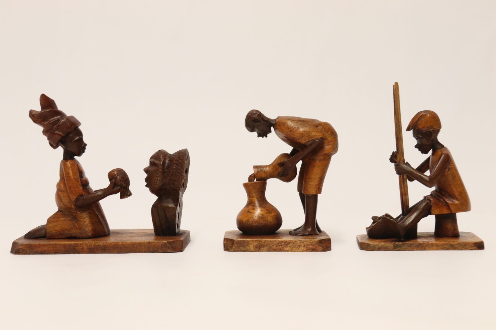 A Group Of 7 Nigerian Hardwood Carved Figures, C 1920 photo furniture