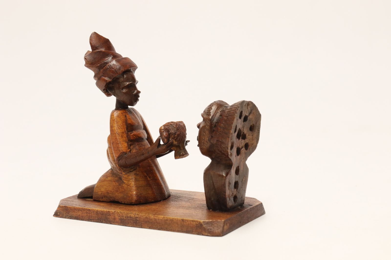 A Group Of 7 Nigerian Hardwood Carved Figures, C 1920 photo for sale