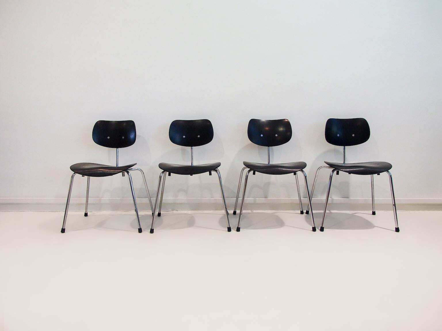Set Of Four Egon Eiermann Model Se 68 Black Lacquered Plywood And Steel Chairs photo furniture