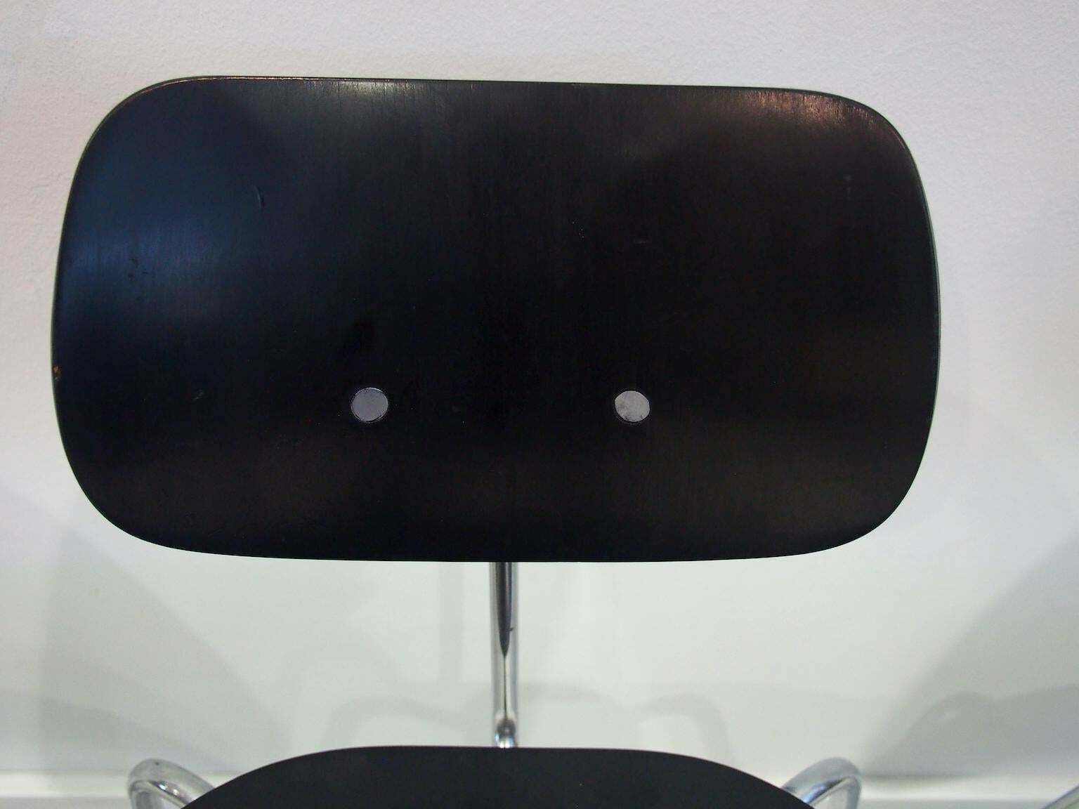 photo furniture Set Of Four Egon Eiermann Model Se 68 Black Lacquered Plywood And Steel Chairs