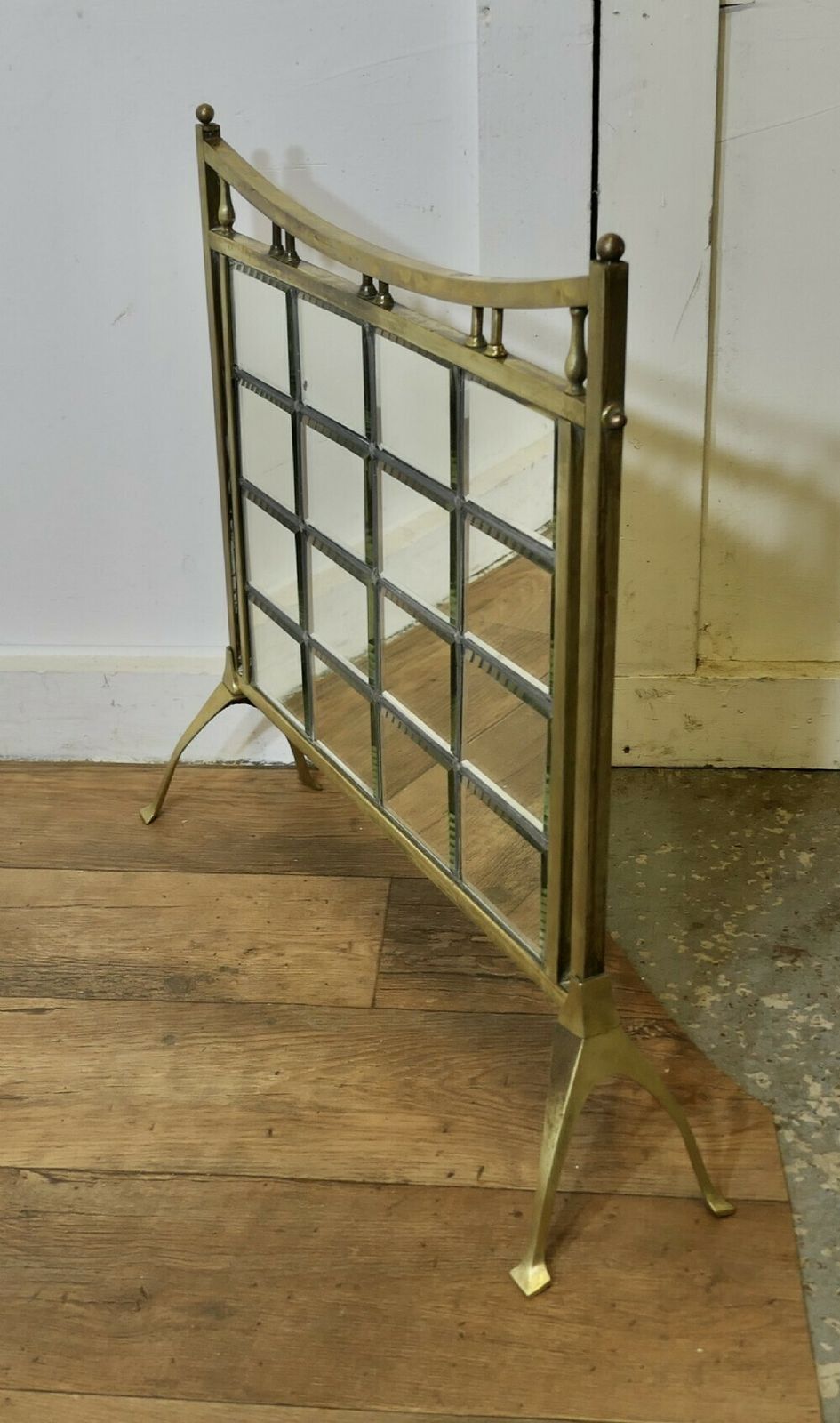 A Victorian Brass And Mirror Arts And Crafts Fire Screen photo 780.0